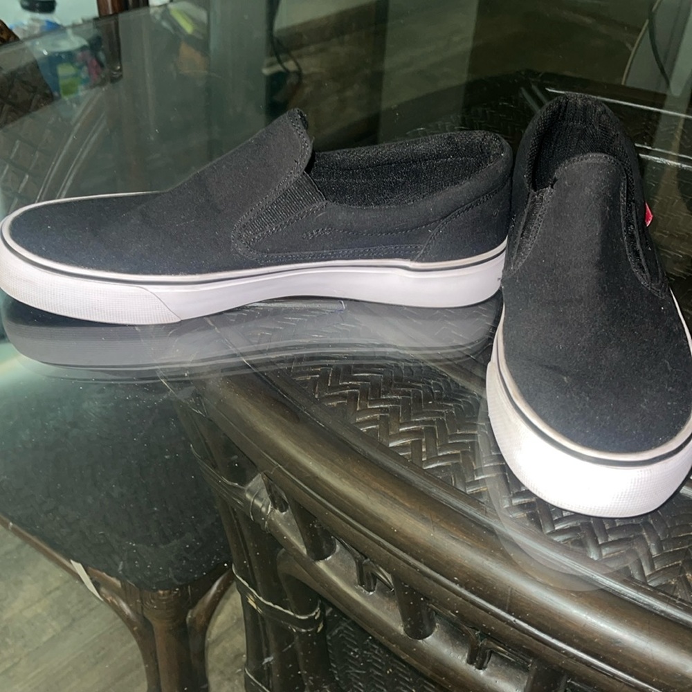 DC men’s black slip on skate shoe